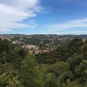 Quarto em Acomodações Particulares Suítes Panorama 10 Minutos Do Centro